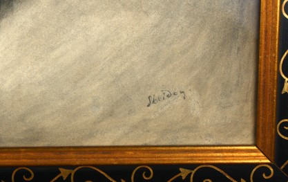 Close up of artist's signature. 