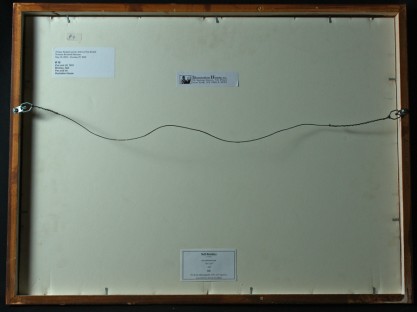 verso view with previous exhibit labels